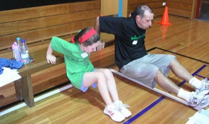 Dad back pressing with his daughter